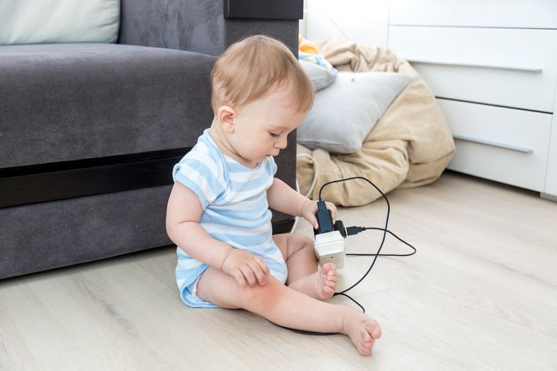 Electrical Safety for Kids, small child playing with a cord.